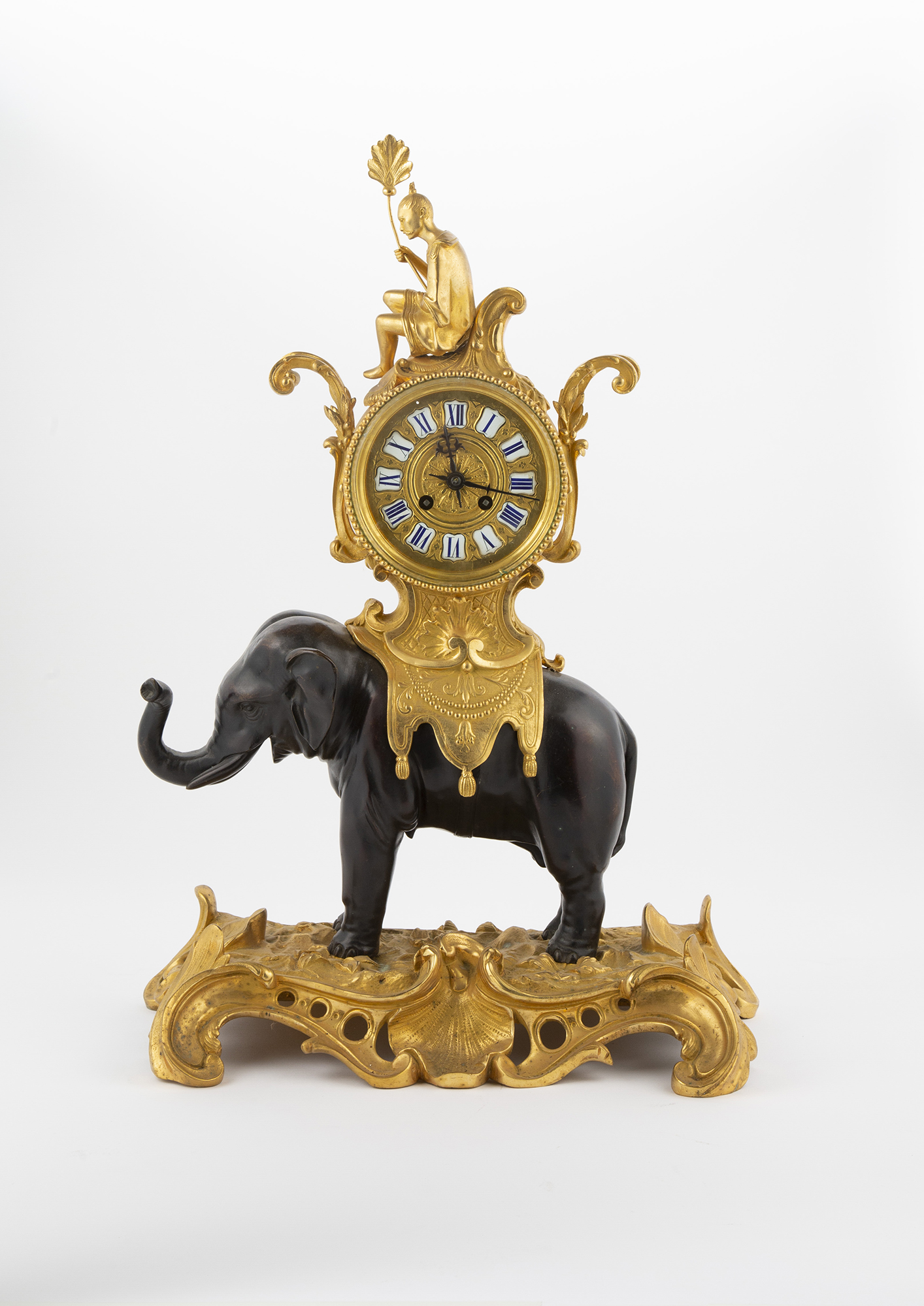 Lot image - Louis XV Style Gilt and Patinated Bronze Clock
