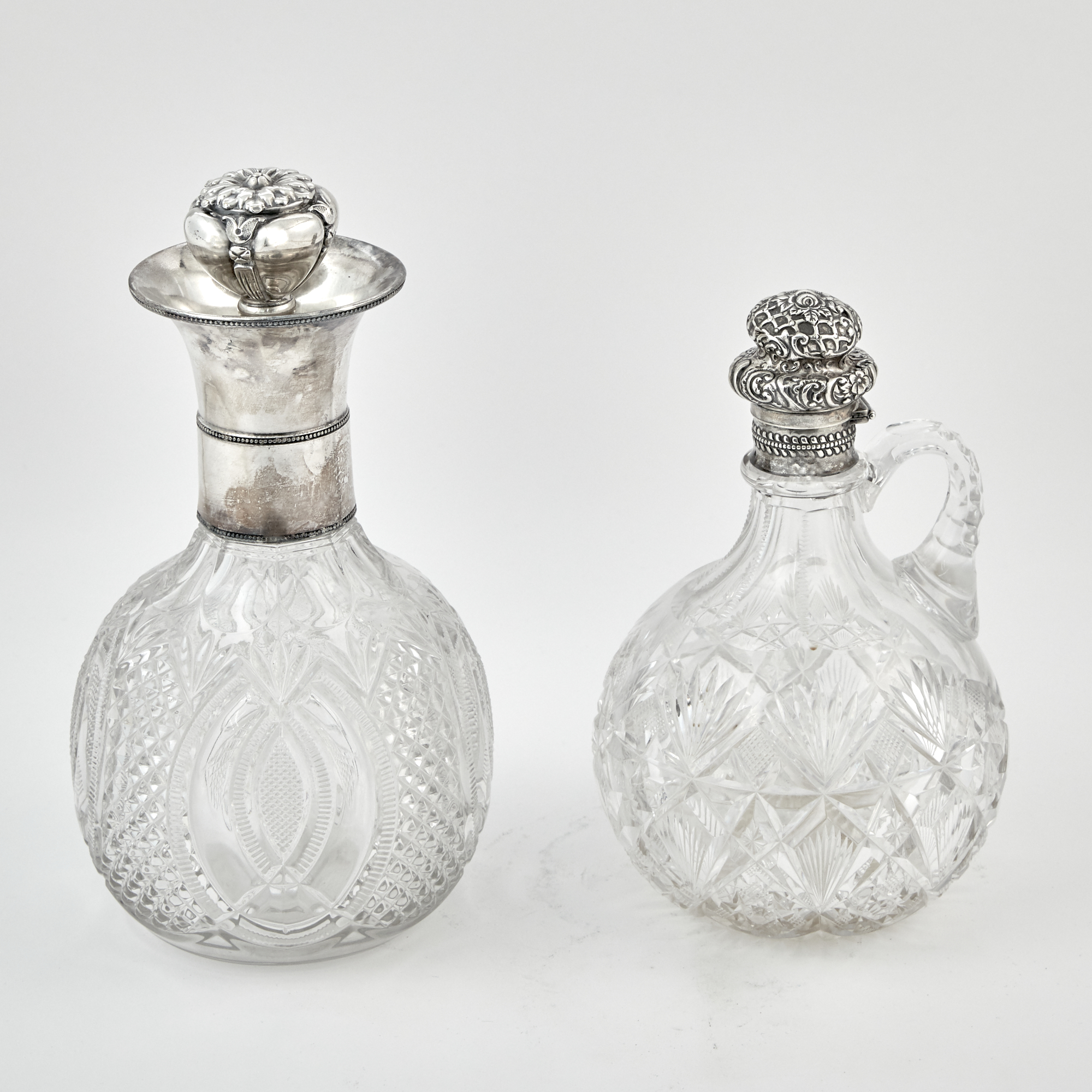 Lot image - Gorham Sterling Silver Mounted Cut Glass Claret Jug and a Silver Plate Example