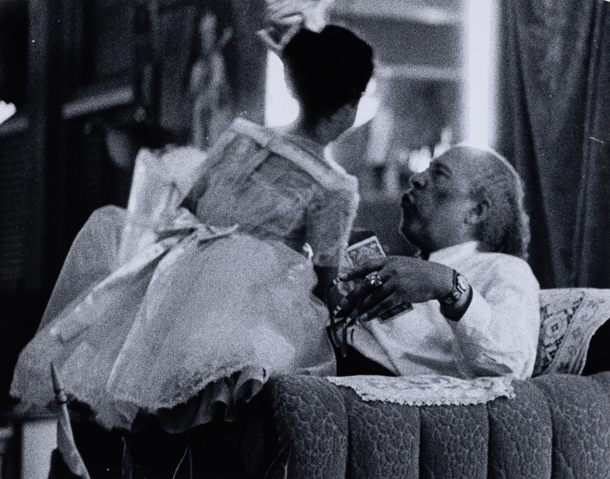 Lot image - WERTHEIMER, ALFRED (1929-2014)  Group of three gelatin silver prints of Charles Manuel Sweet Daddy Grace.