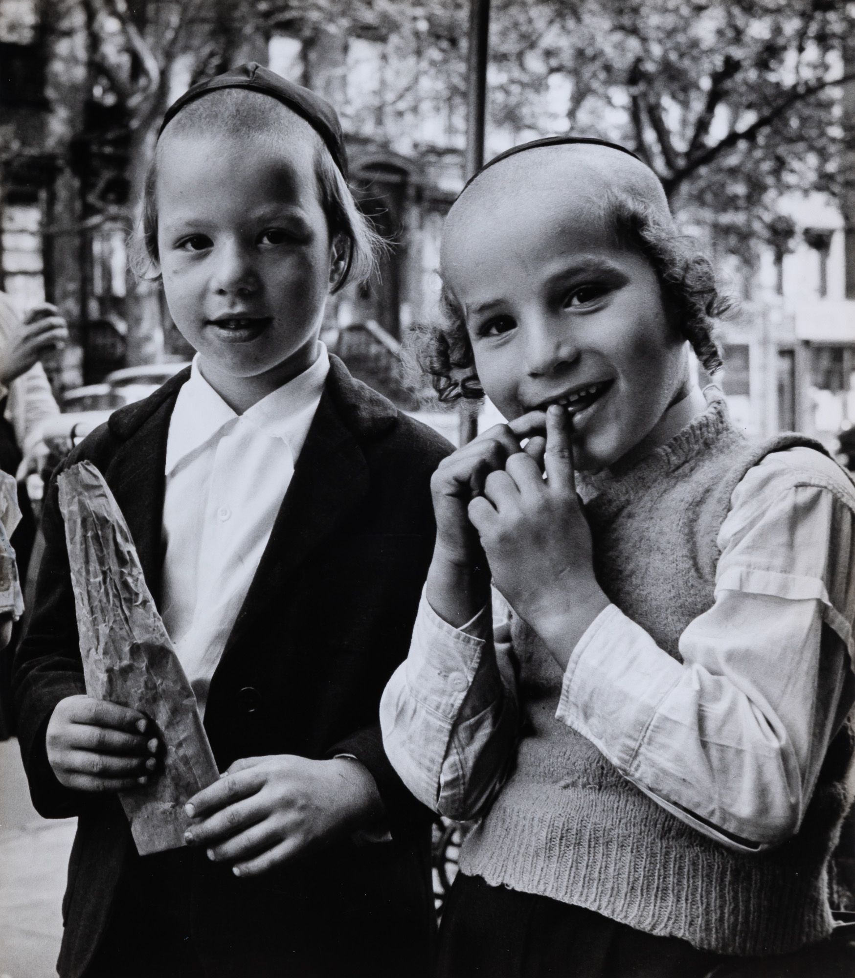 Lot image - WERTHEIMER, ALFRED (1929-2014)  Group of three gelatin silver prints of New York Hassidim.