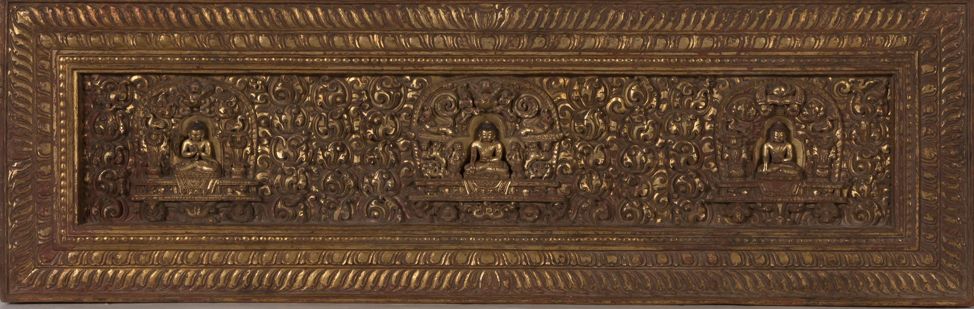Lot image - Tibetan Gilt-Wood Manuscript Cover