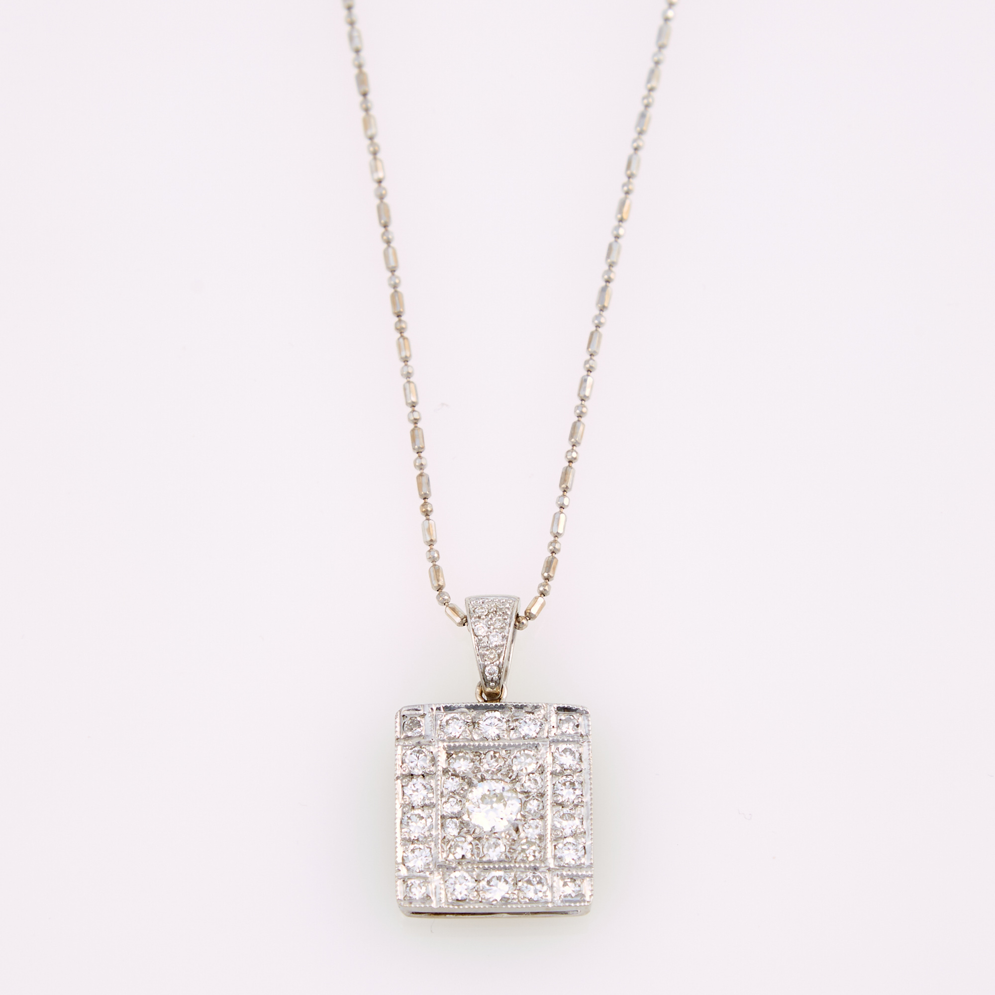 Lot image - Diamond Pendant, 38 diamonds about 1.00 ct. and Gold Neck Chain, 14K 5 dwt.