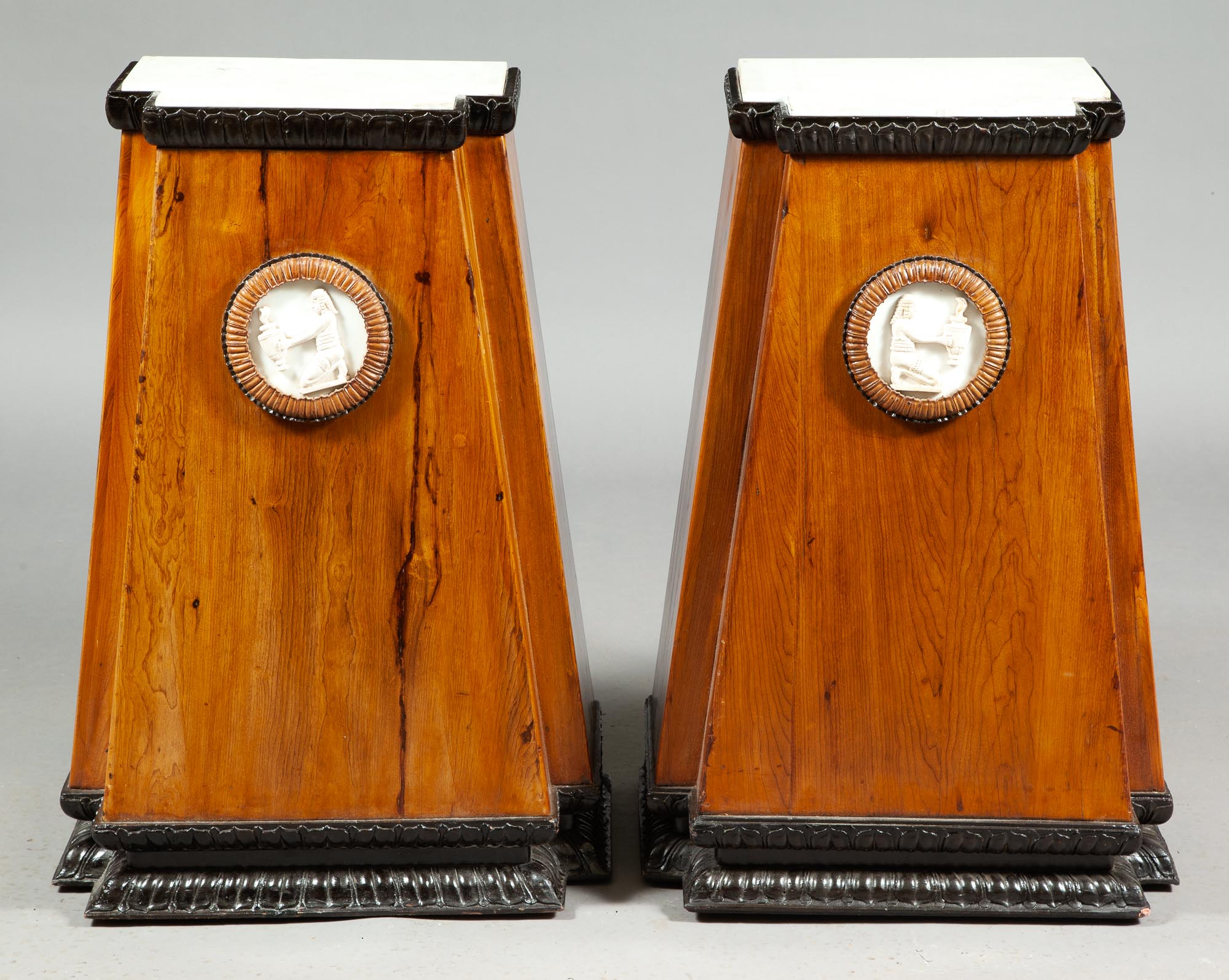 Lot image - Pair of Egyptian Revival Pine and Part-Ebonized Marble Top Pedestals