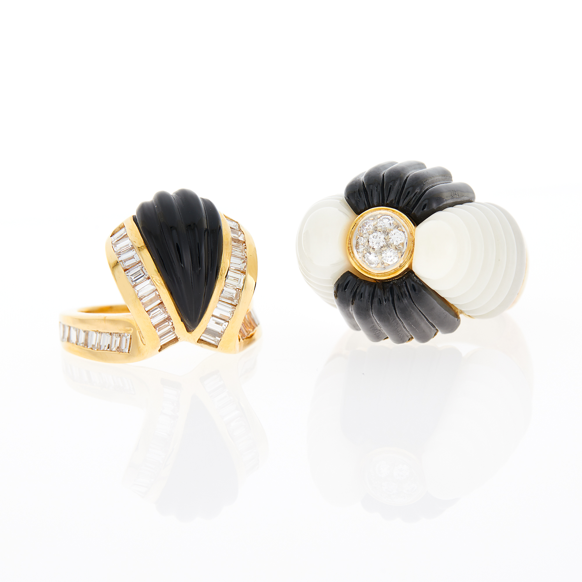 Lot image - Two Gold, Carved Black and White Onyx and Diamond Rings