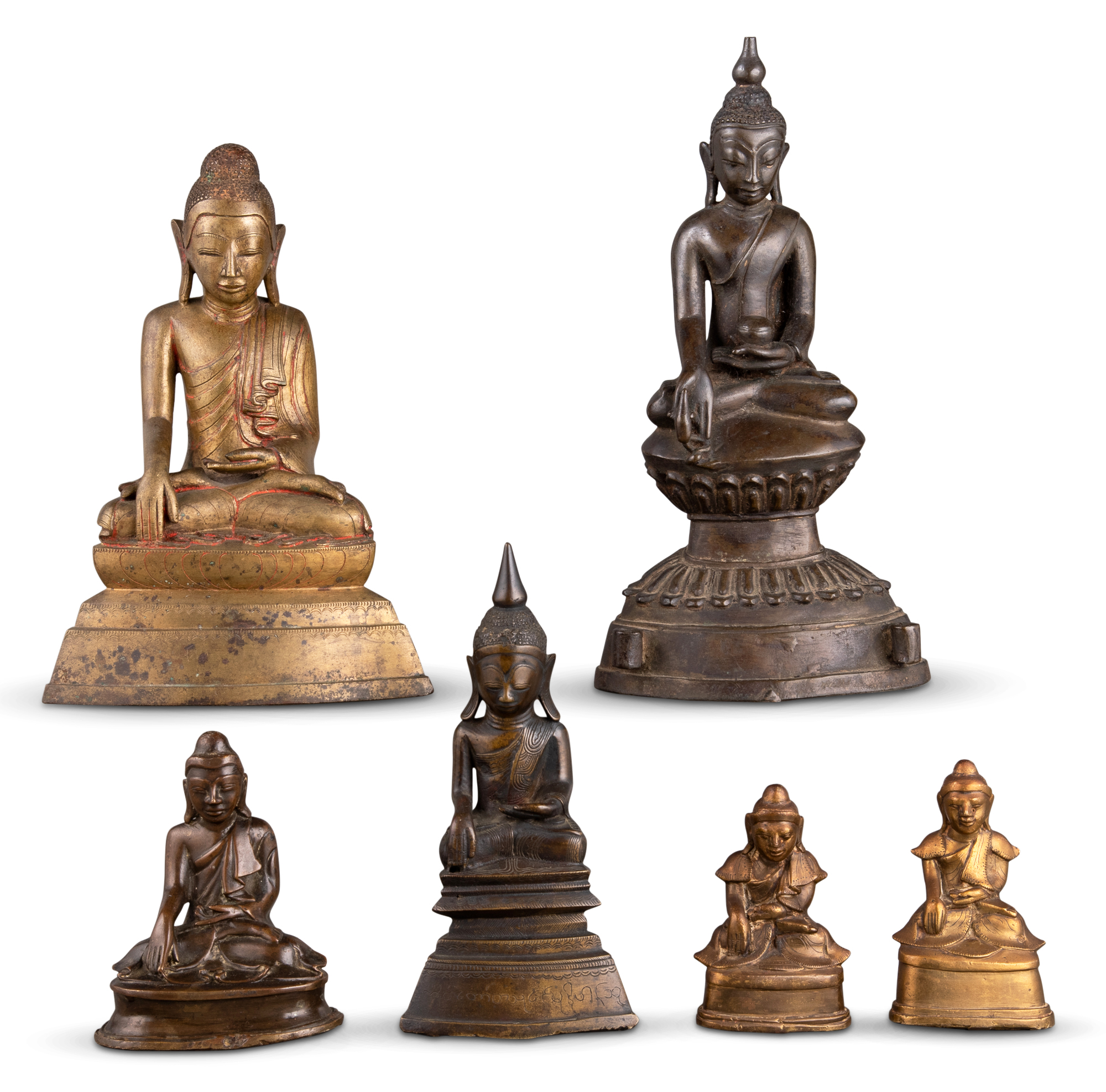 Lot image - A Group of Six Southeast Asian Bronze Buddhas