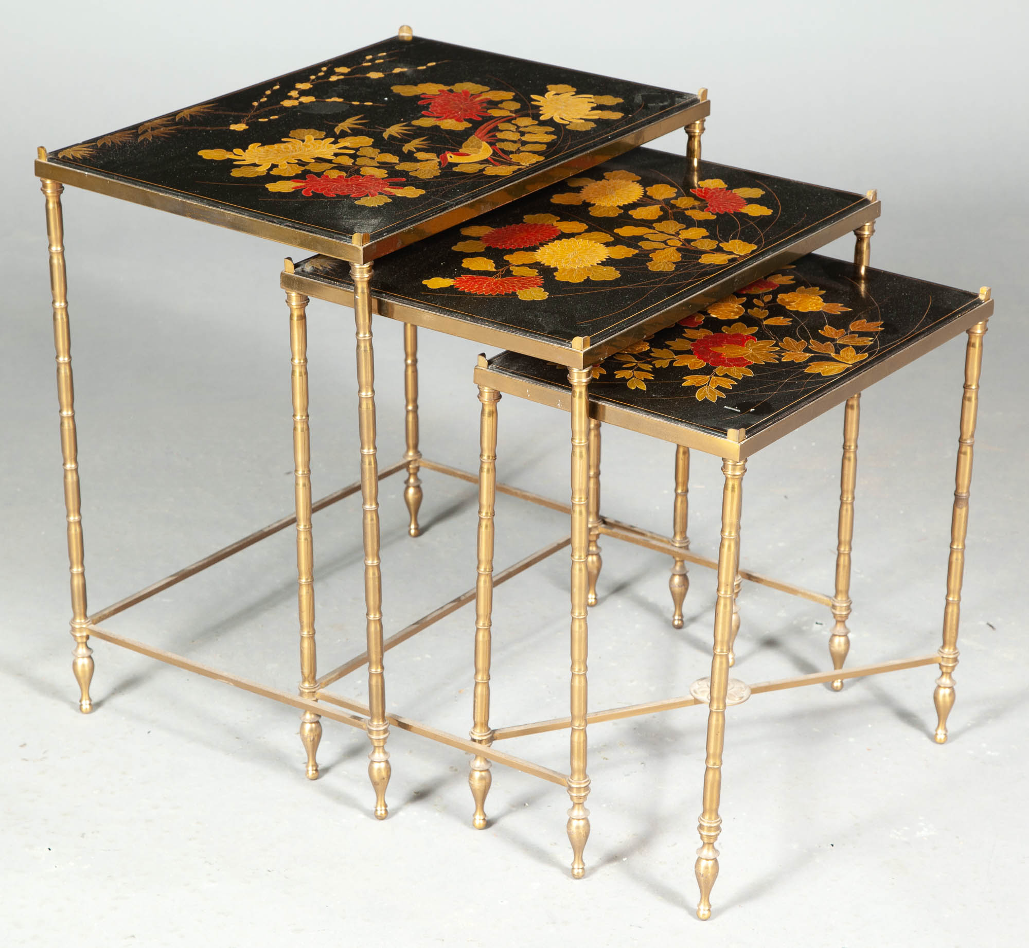 Lot image - Nest of Three Japanned, Parcel-Gilt and Gilt-Metal Occasional Tables