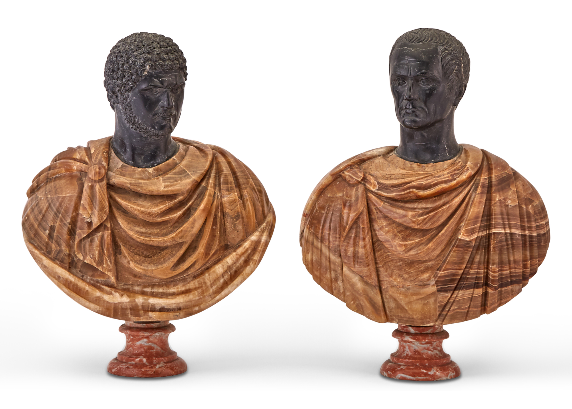 Lot image - Pair of Continental Black Marble and Alabaster Portrait Busts of Caracalla and Julius Caesar
