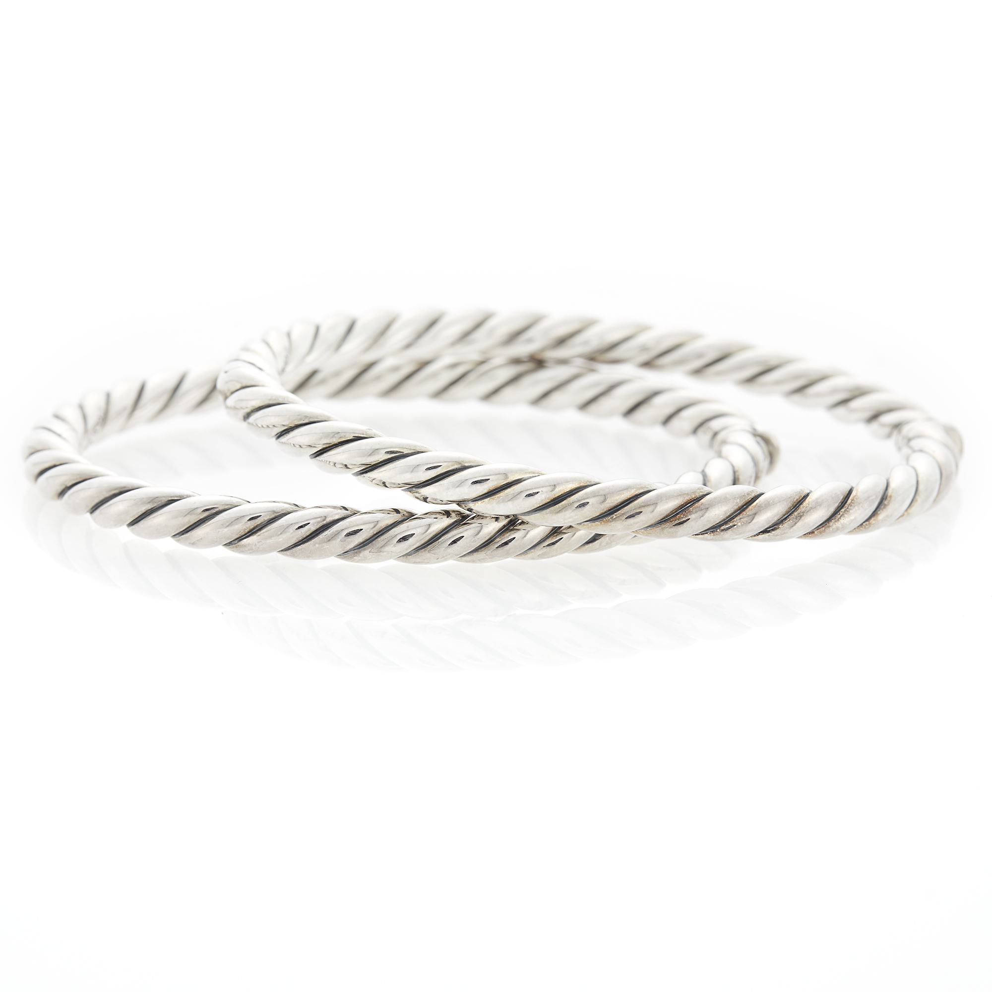 Lot image - David Yurman Pair of Silver Bangle Bracelets