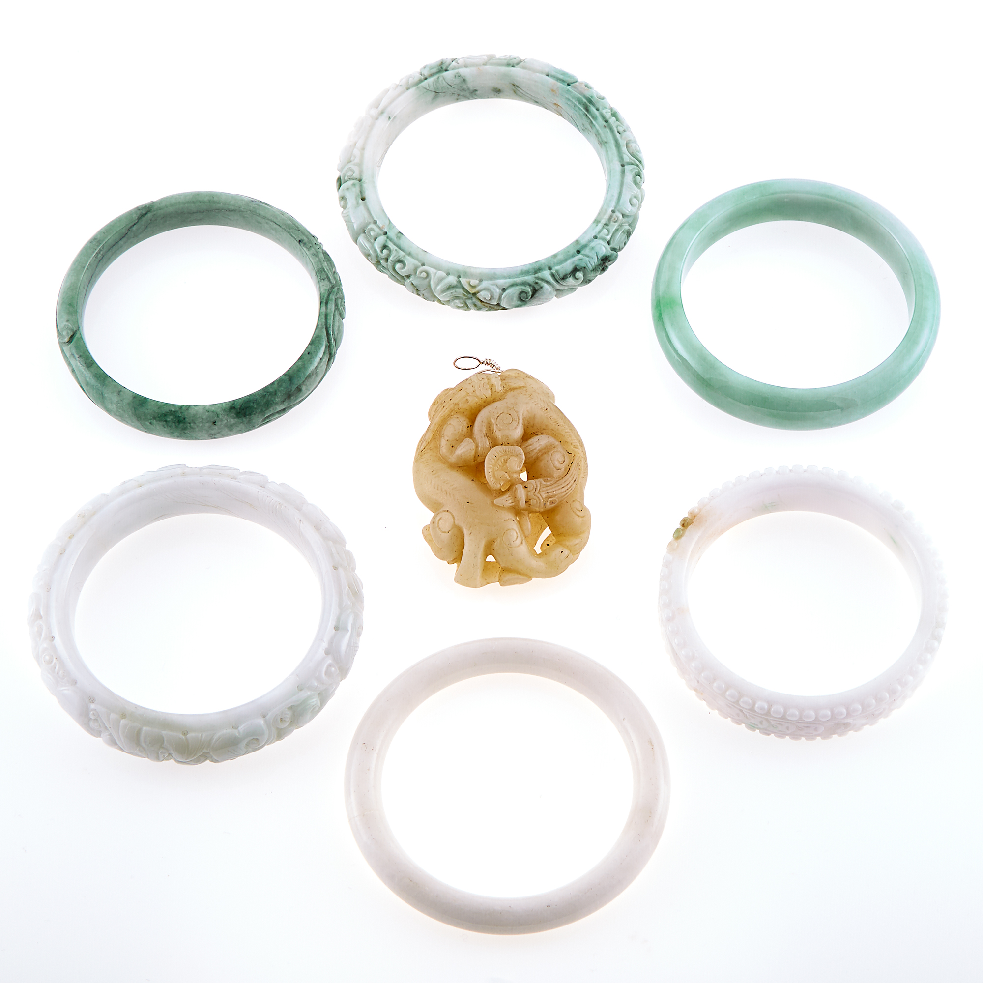 Lot image - Six Jade Bangle Bracelets and Carved Jade Pendant