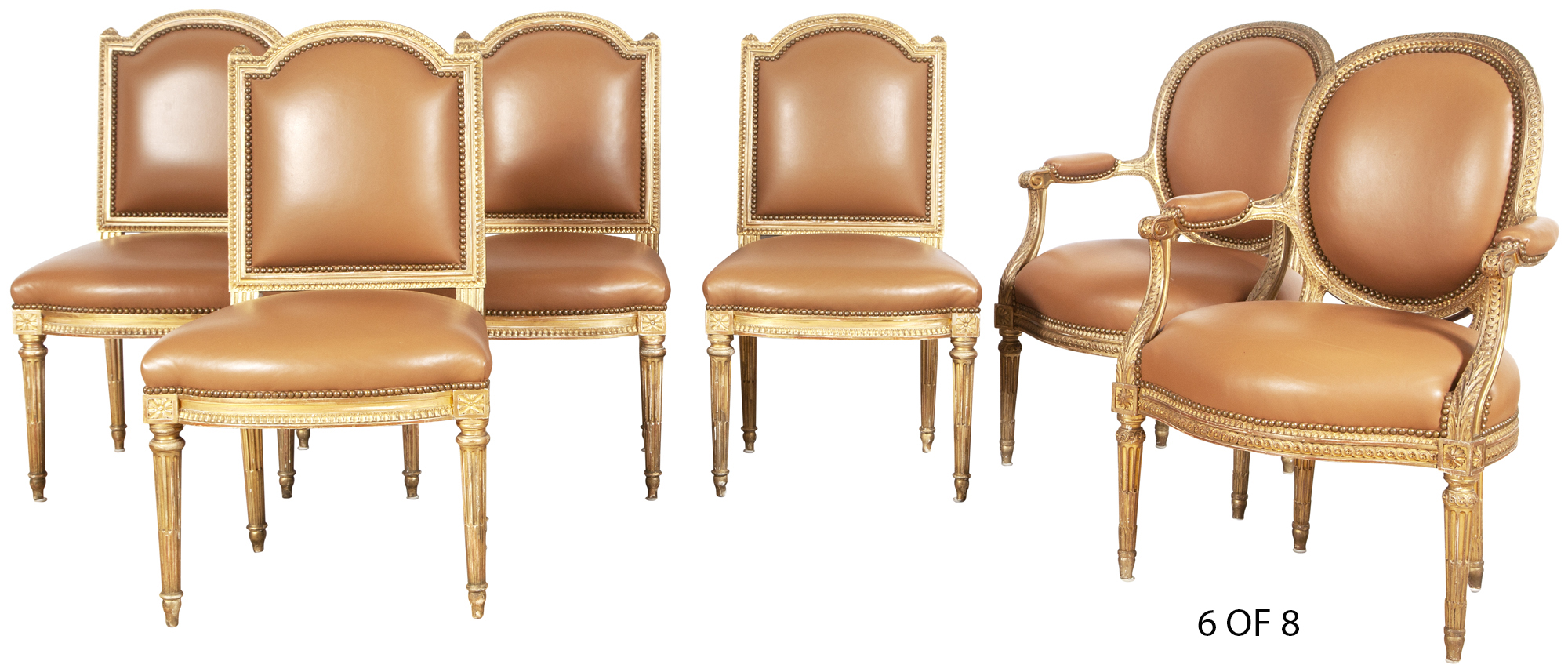 Lot image - Assembled Set of Eight Louis XVI Style Giltwood and Leather-Upholstered Dining Chairs