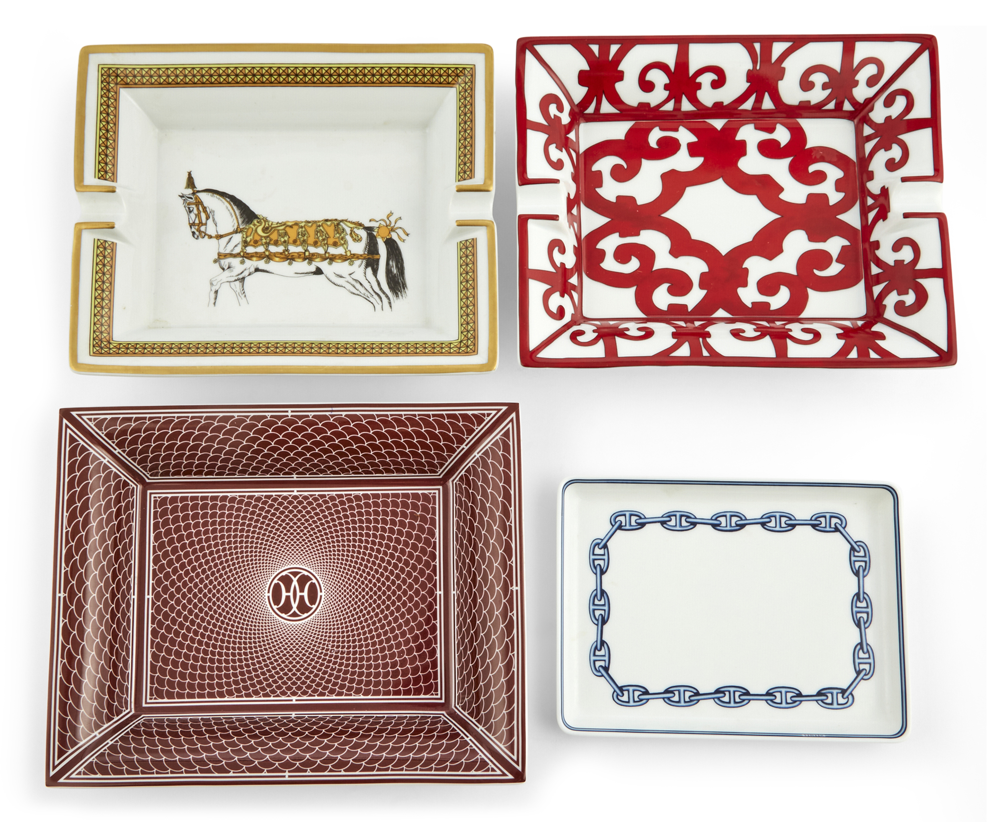 Lot image - Group of Four Hermes Porcelain Dishes and Ashtrays