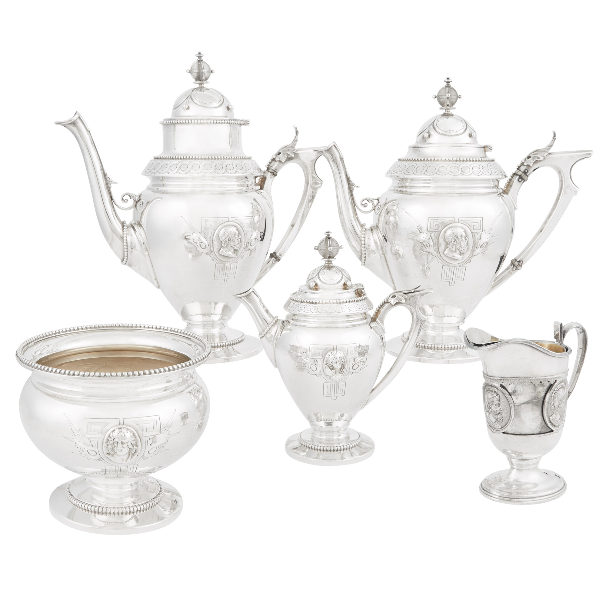 Lot image - Wood & Hughes Coin Silver Medallion Pattern Tea and Coffee Service