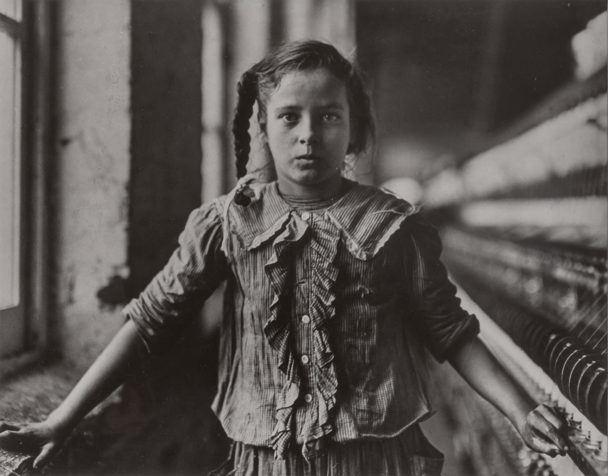 Lot image - HINE, LEWIS WICKES (1874-1940)  [Ten Year Old Spinner, North Carolina Cotton Mill, 1908].