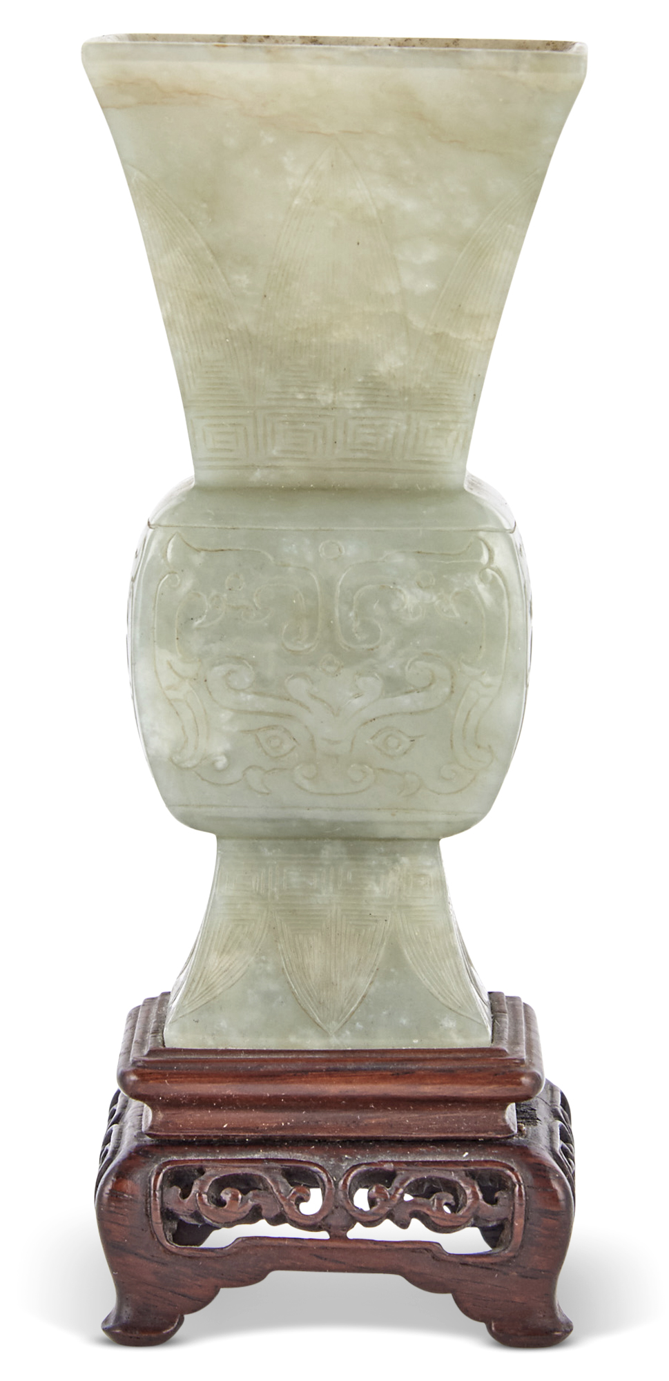 Lot image - A Chinese Carved Celadon Jade Gu Vase