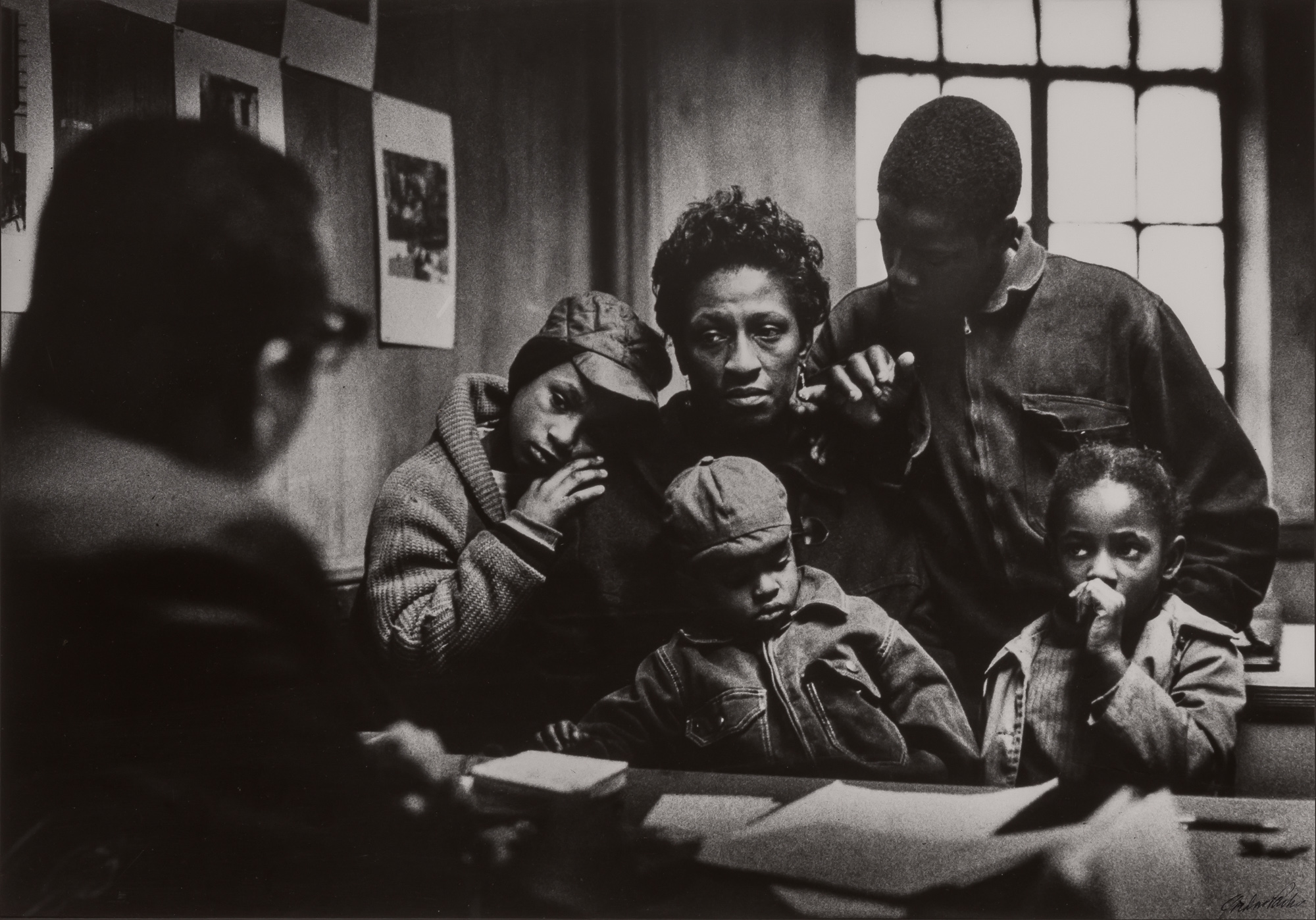 Lot image - PARKS, GORDON (1912-2006)  Bessie Fontenelle and Children at Welfare Office, New York,