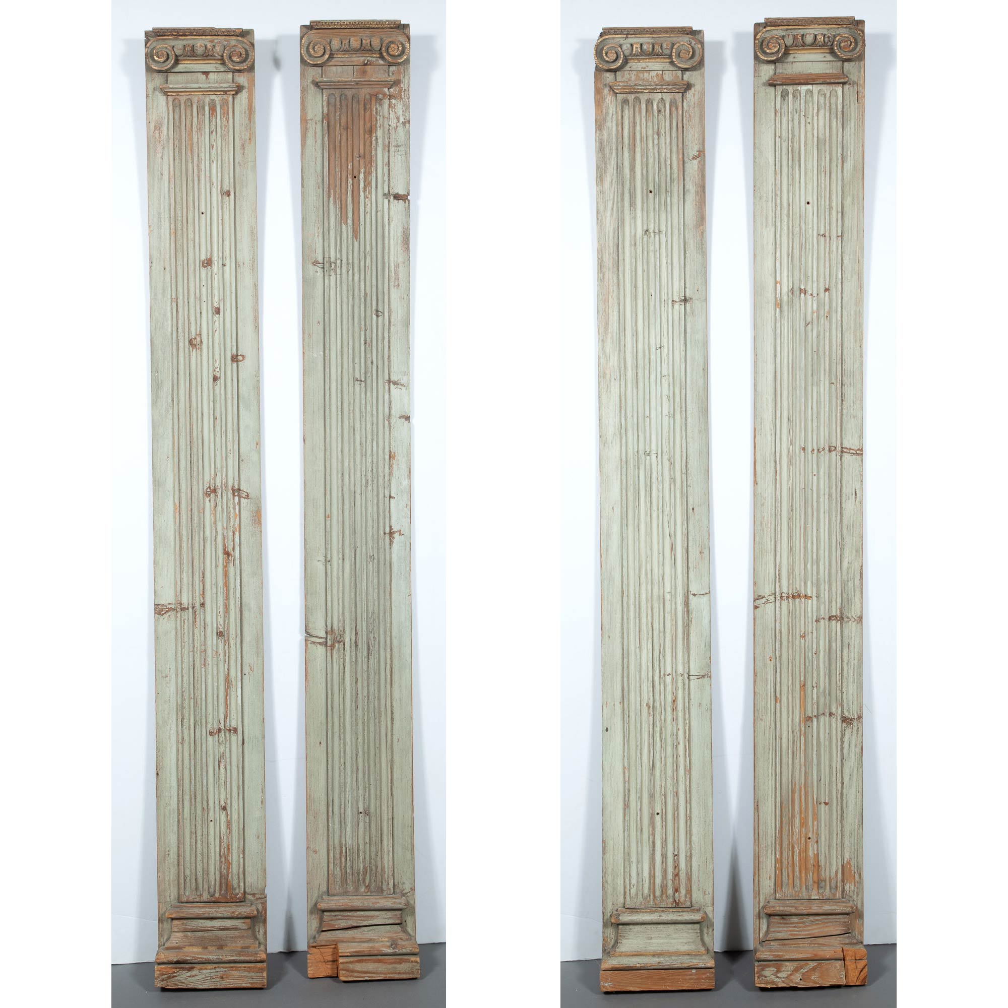 Lot image - Set of Four Painted and Parcel-Gilt Pilasters with Ionic Capitals