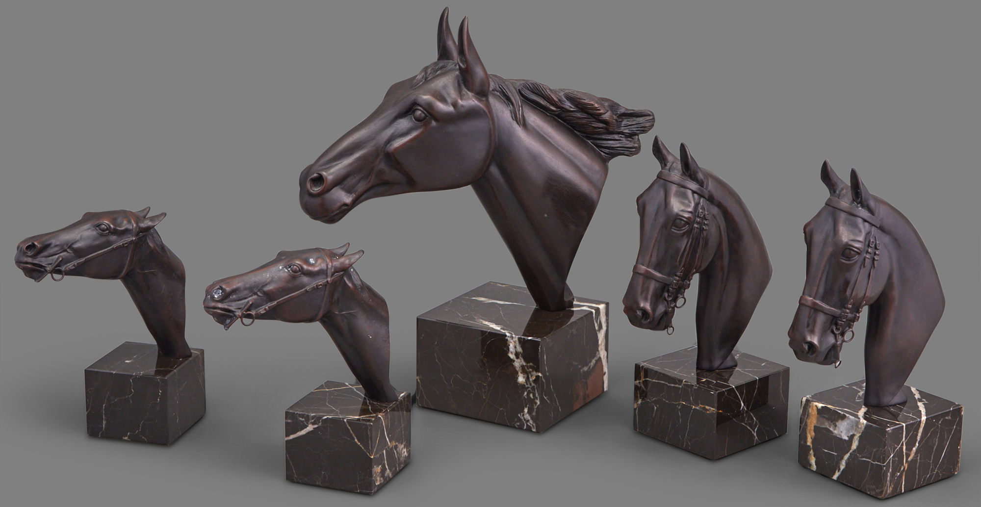 Lot image - Group of Five Patinated Metal Horse Head Busts