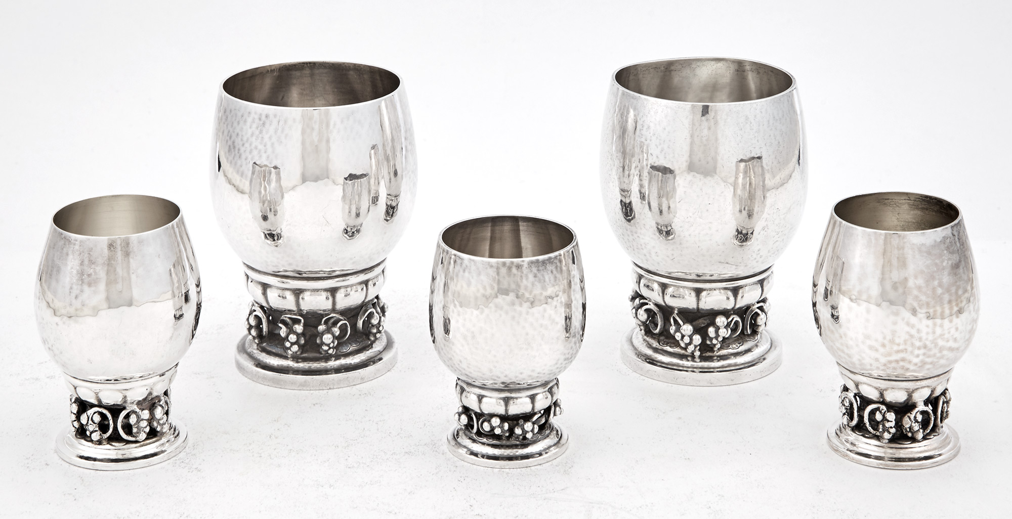 Lot image - Two Georg Jensen Sterling Silver Grape Pattern Beakers