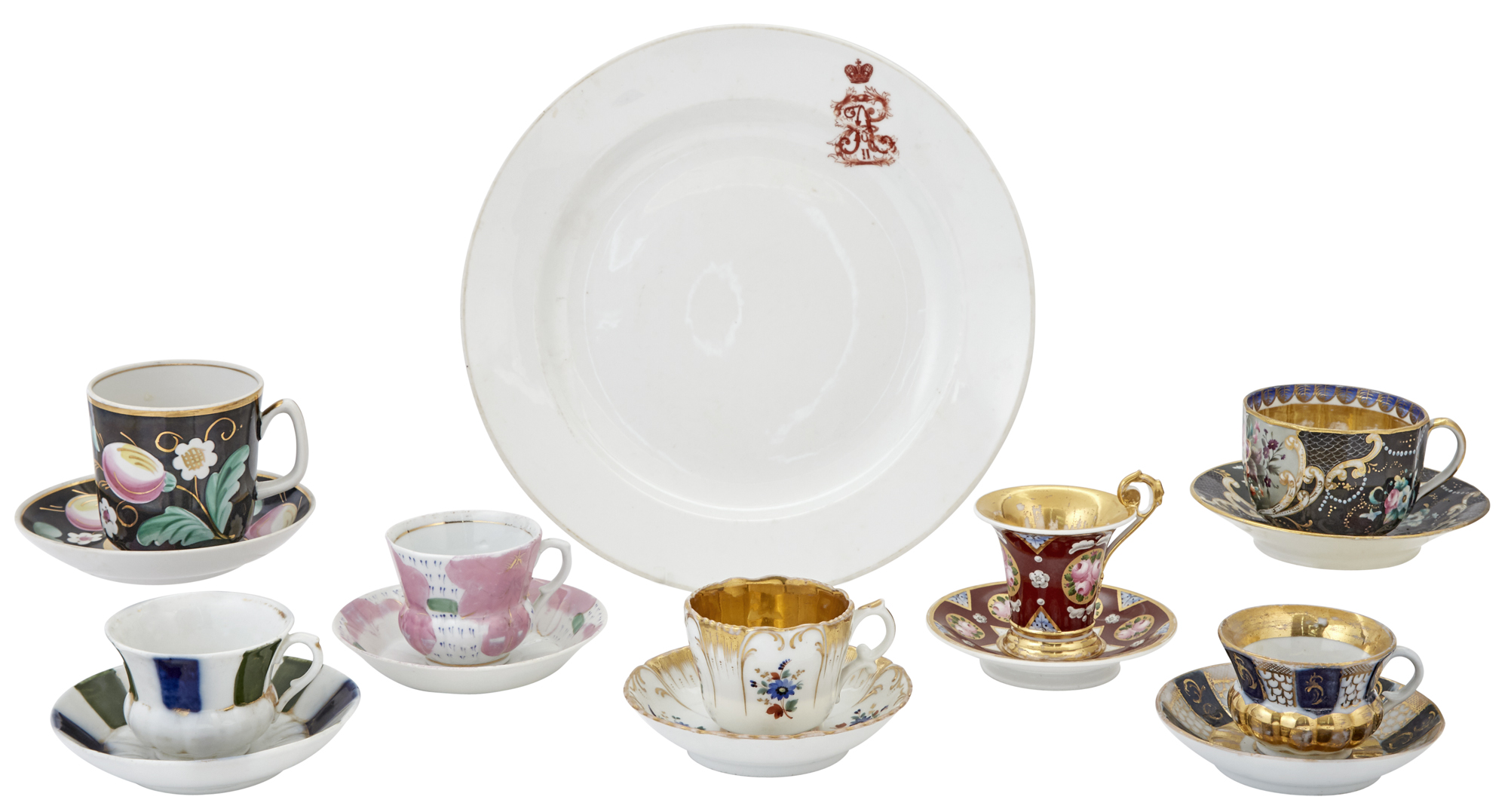 Lot image - Group of Seven Russian and Soviet Porcelain Cups and Saucers; Together with a Kornilov Porcelain Plate