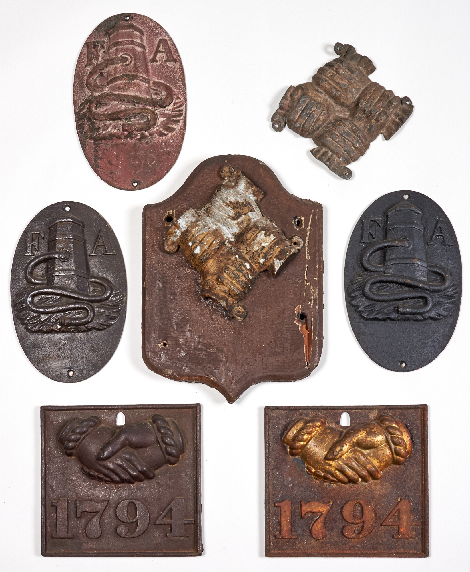 Lot image - Group of Seven Cast Iron Fire Marks