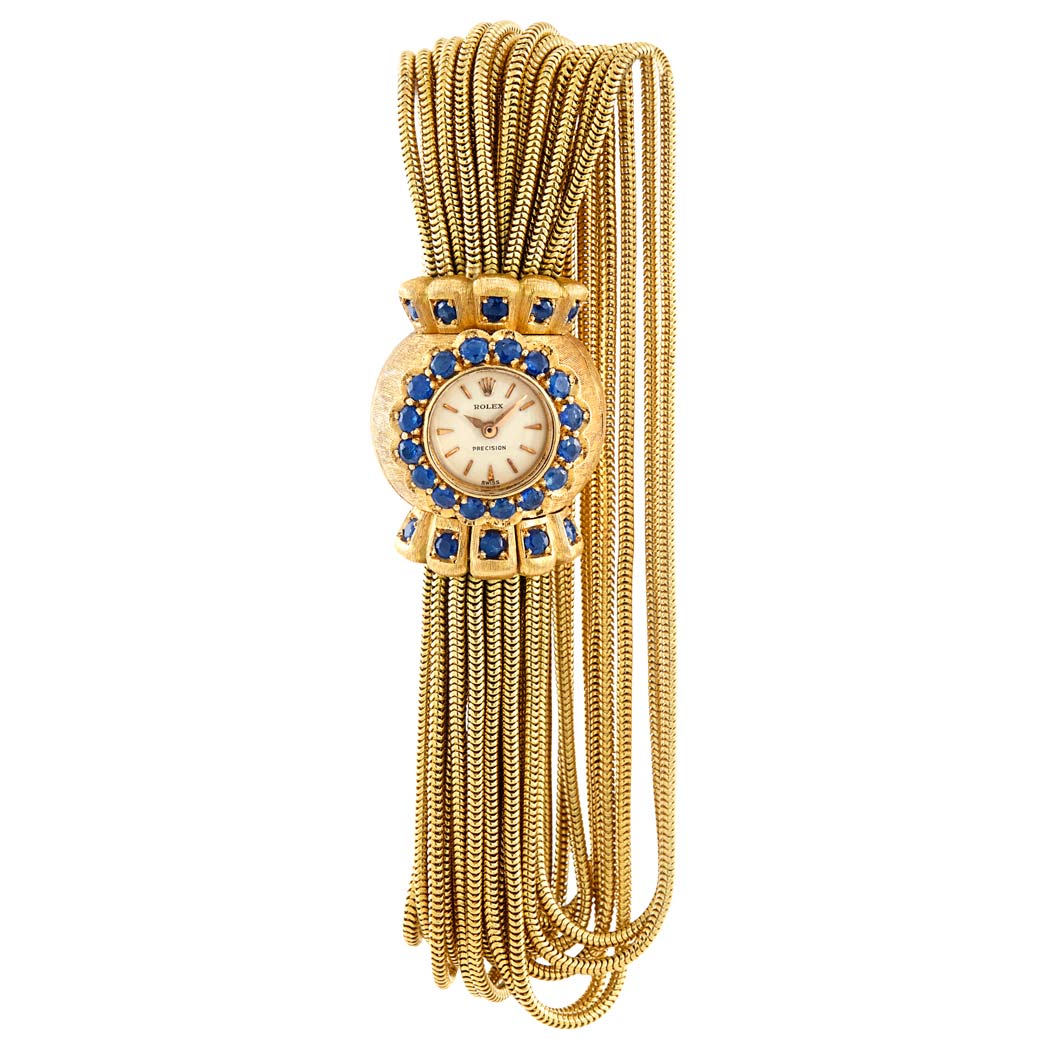 Lot image - Multistrand Gold and Sapphire Snake Chain Bracelet-Watch, Rolex