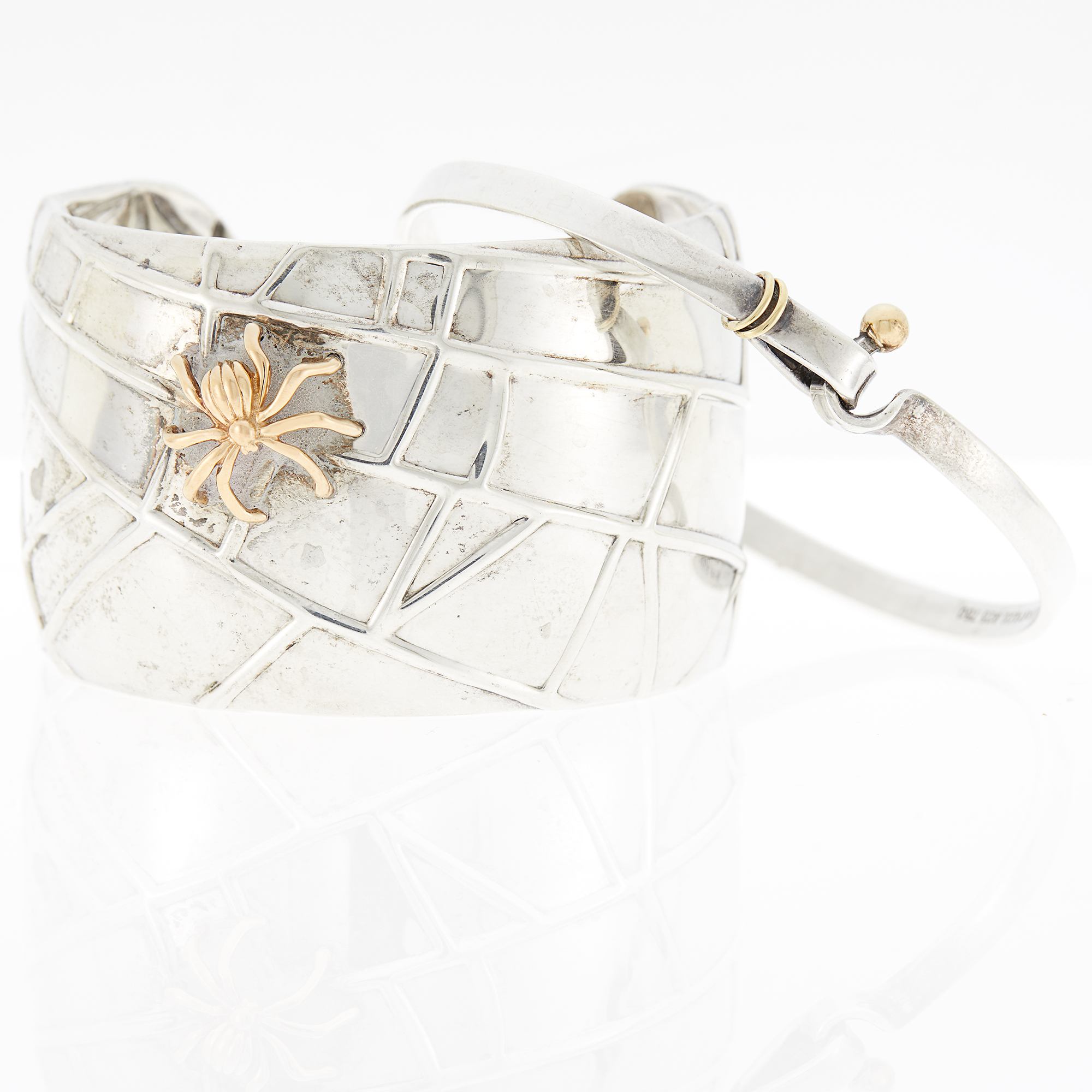 Lot image - Tiffany & Co. Two Silver and Gold Bangle Bracelets