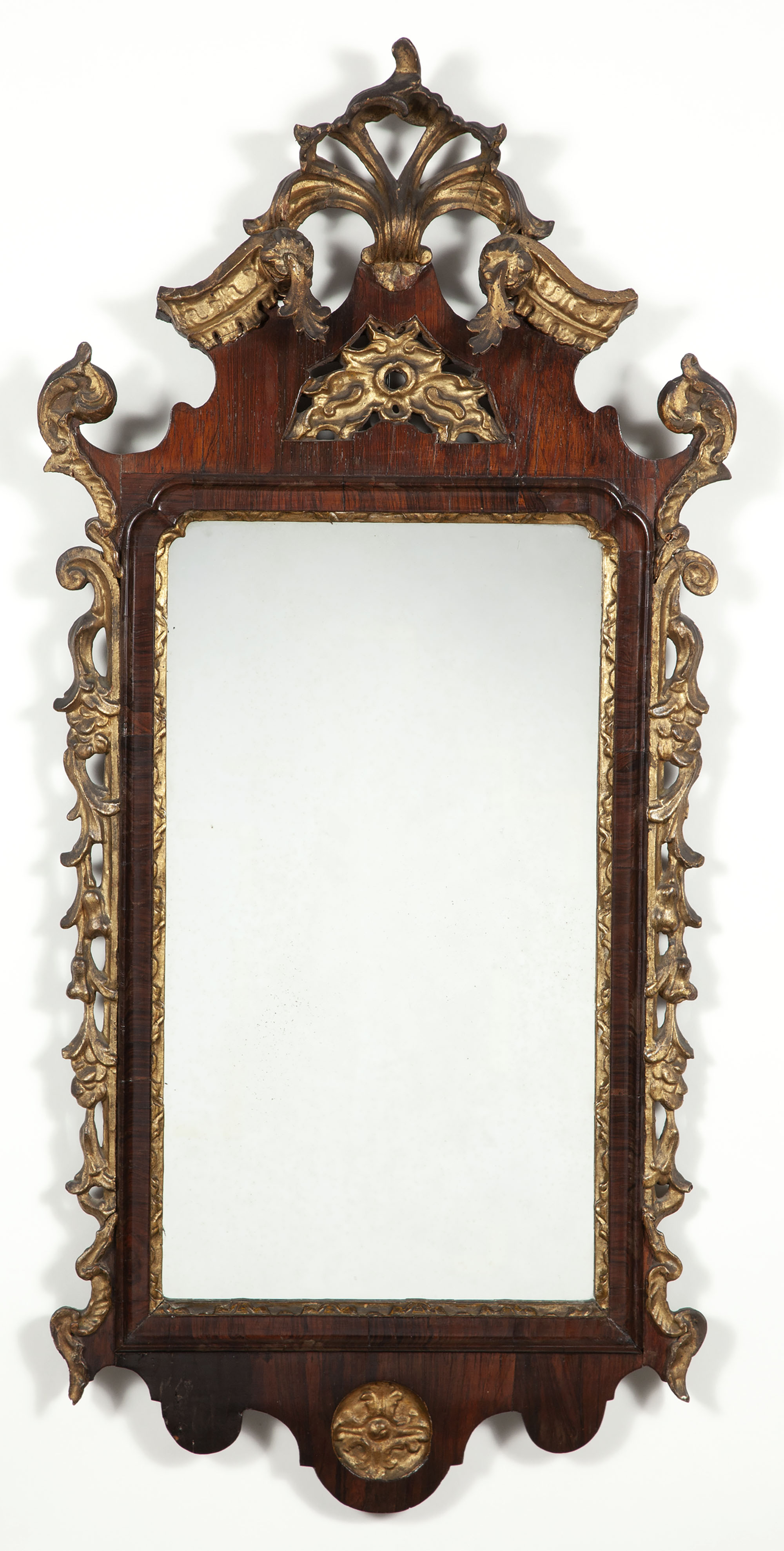 Lot image - Continental Rococo Kingwood and Parcel-Gilt Mirror