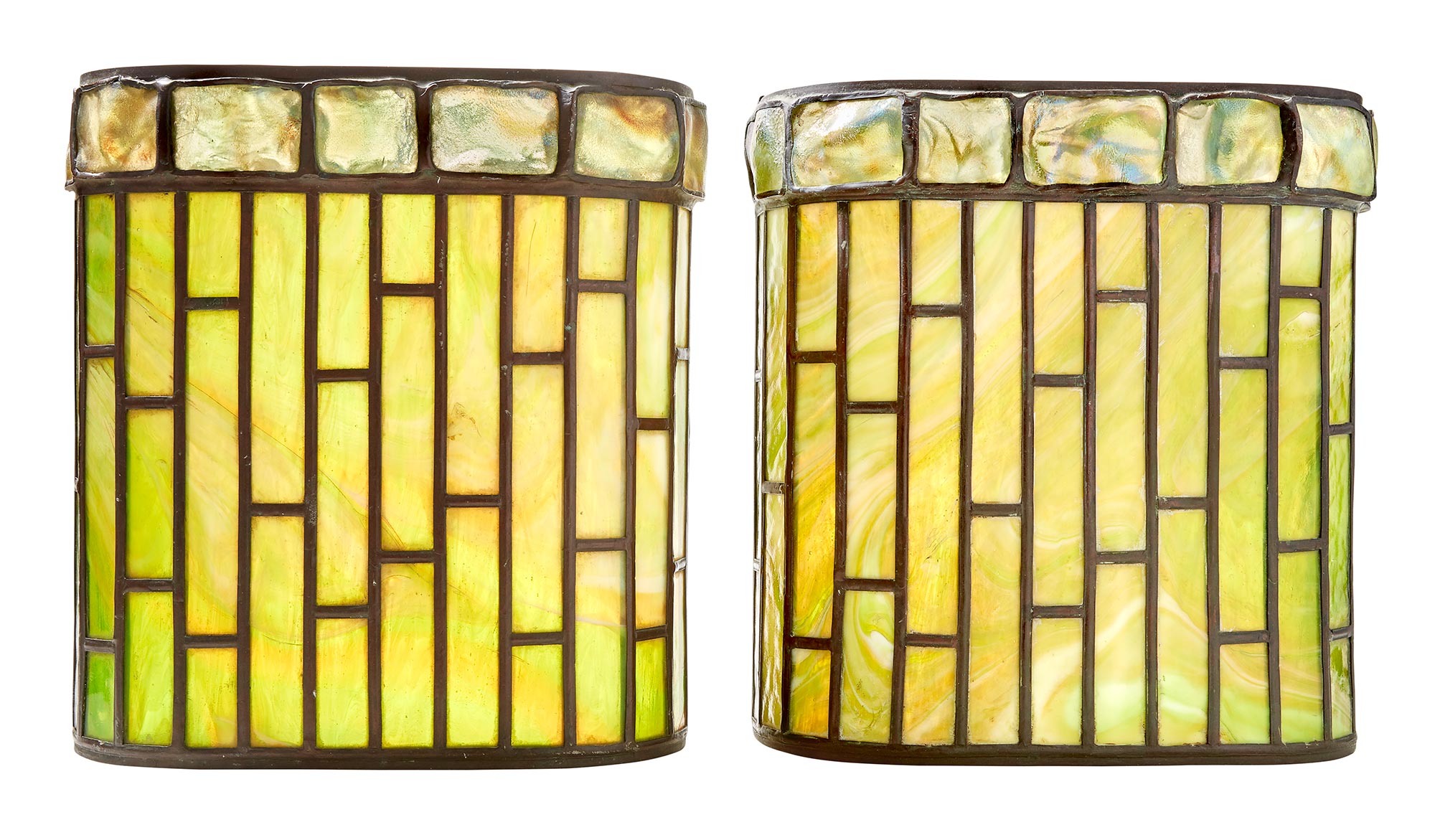 Lot image - Pair of Tiffany Studios Bronze, Leaded Geometric Glass and Turtle Back Tile Sconces