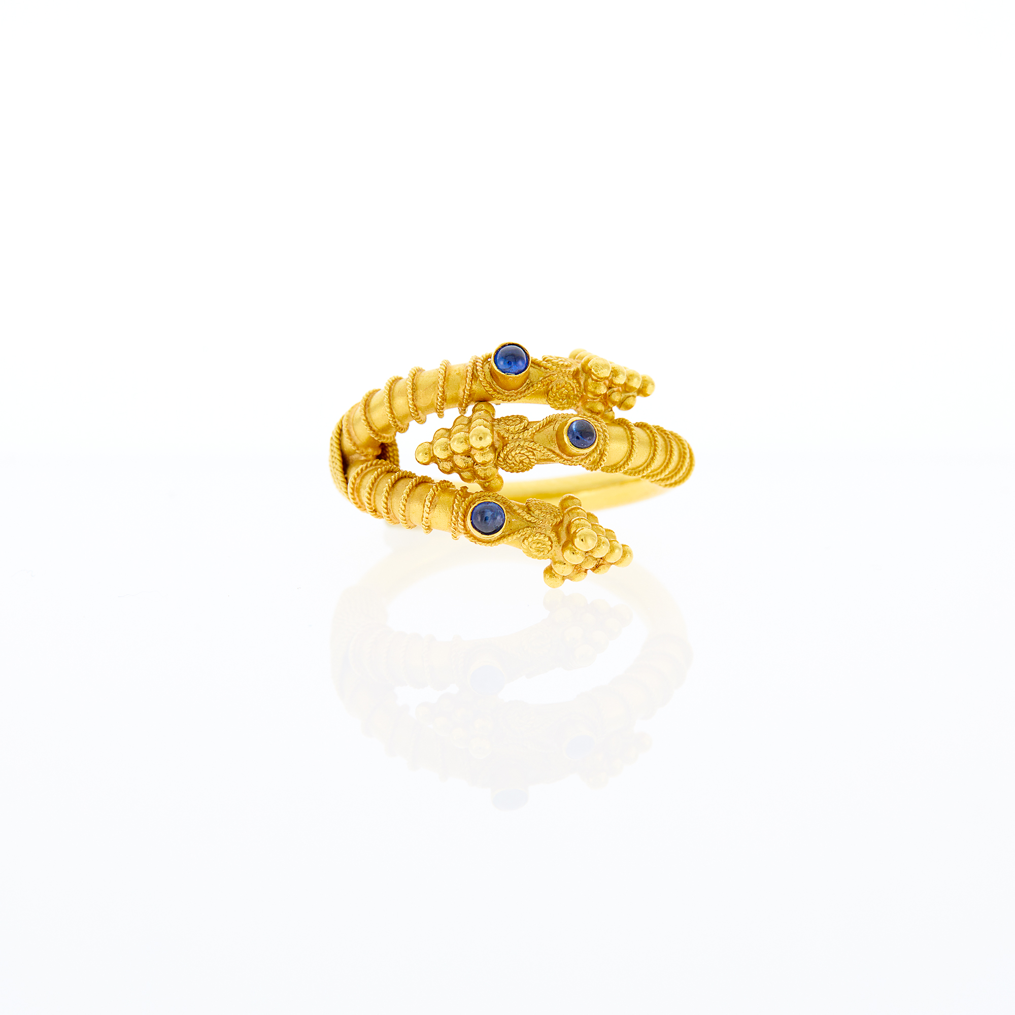 Lot image - High Karat Gold and Cabochon Sapphire Ring
