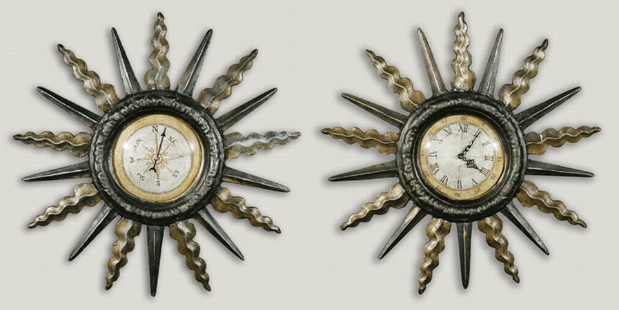 Lot image - Two Black Painted and Parcel Gilt Resin Sunbursts