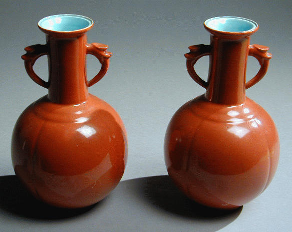 Lot image - Pair of Coral-Ground Lobed Bottle Vases 18th/Early 19th