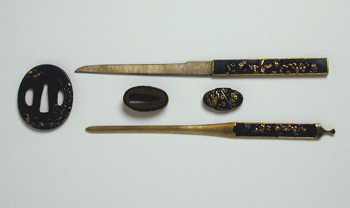 Lot image - Shakudo Nanako Mitokuromono and a Tsuba 19th Century, tsuba signed Bokuensai Ishiguro Masaaki, the kozuka and k