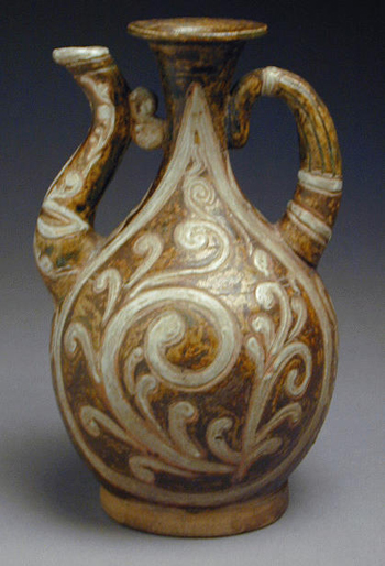 Lot image - Carved and Ochre Slip-Decorated Sawankhalok Ewer 16th Century