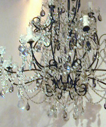 Lot image - Neoclassical Style Metal and Cut Glass Twelve-Light Chandelier