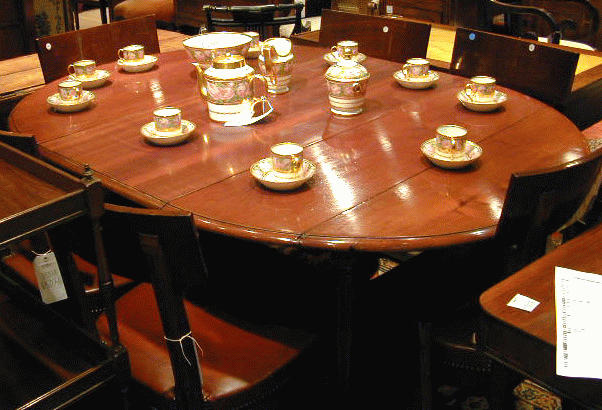 Lot image - Louis XVI Style Mahogany Drop-Leaf Extension Dining Table