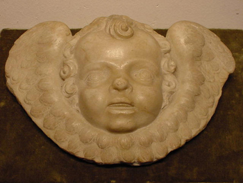 Lot image - Italian School 17th Century CHERUB HEAD Marble 8 1/2 x 12 inches (21.6 x 30.5 cm.)...
