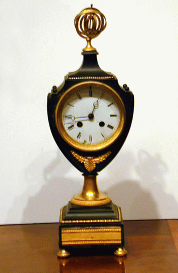 Lot image - Charles X Gilt and Patinated-Bronze Mantel Clock