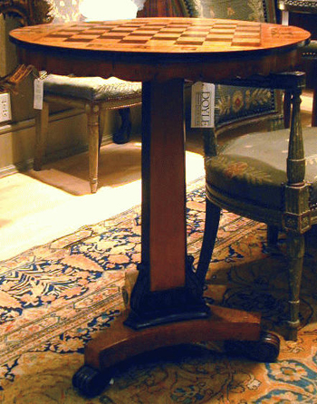 Lot image - Continental Neoclassical Mahogany and Fruitwood Tilt-Top Games Table