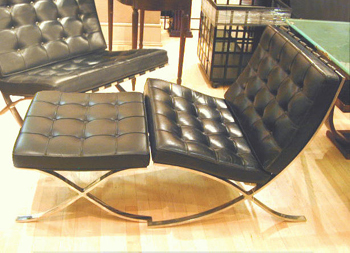 Lot image - Pair of Chrome and Leather Barcelona Chairs and an Ottoman Ludwig Mies van der Rohe, 1929