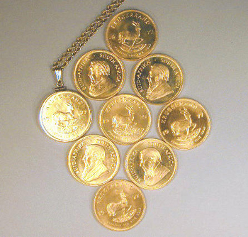 Lot image - Nine Gold Krugerrands
