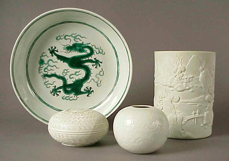 Lot image - Three White Porcelain Scholars Articles and a Green Dragon Dish 18th and 19th Centuries