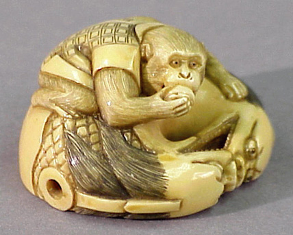 Lot image - Ivory Netsuke of a Sarumawashi Monkey and Mokugyo