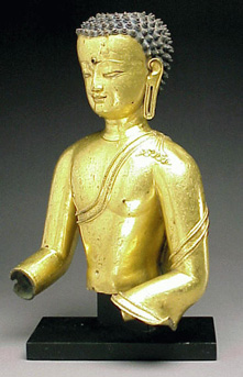 Lot image - Fine Tibetan Gilt-Copper Alloy Torso of Buddha 13th/14th Century