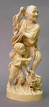 Lot image - Large Single Piece Ivory Group of a Boatman and Boy