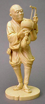 Lot image - Ivory Figure of a Man with Lantern