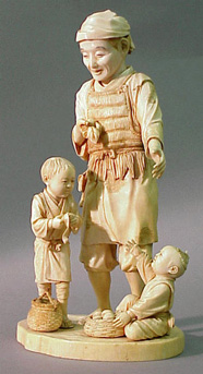 Lot image - Sectional Ivory Group of a Farmer with Two Boys