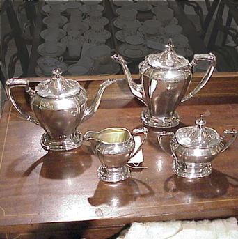 Lot image - Sterling Silver Four-Piece Tea and Coffee Service Total approximately 62 ounces, all in.