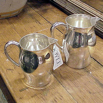 Lot image - Two Sterling Silver Water Pitchers Total approximately 40 ounces.