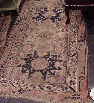 Lot image - Kurdish Rug, Belouch Rug, Kazak Rug and a Shirvan Rug