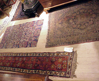 Lot image - A Lavar Kirman Rug, Kirman Rug, Hamadan Rug and a Shirvan Rug